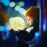 LED Moon Lamp kid holding