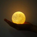 LED Moon Lamp yellow in hand