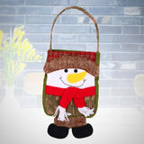 Snowman Gift Bag near brick wall